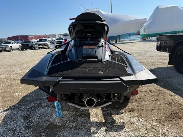 Slide: The Image of 2019 Yamaha WaveRunner SVHO jet ski parked on gravel lot, rear view. - 6