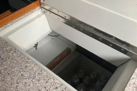 Slide: The Image of Built-in cooler on 1996 Santa Cruz 52 yacht with drinks inside. - 15