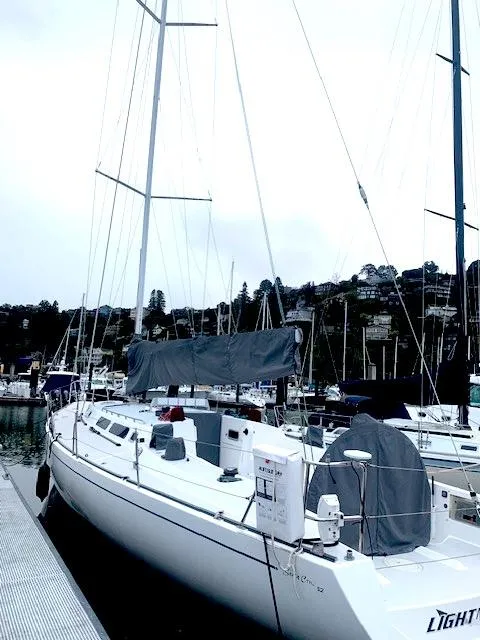 Slide: The Image of Sailboat docked at marina, Santa Cruz 52, 1996 model, overcast sky. - 4