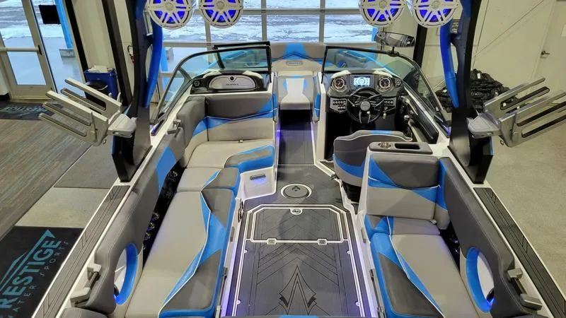 Slide: The Image of Interior of a 2018 Supra SL 450 boat with modern seating and audio system. - 7