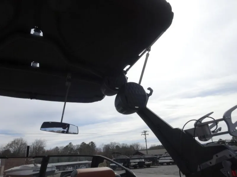 Slide: The Image of 2025 Malibu 24 MXZ boat interior with speakers and rearview mirror. - 19