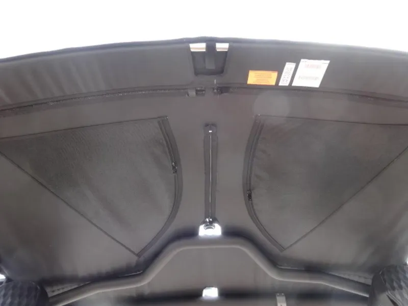 Slide: The Image of 2025 Malibu 24 MXZ boat interior storage compartments. - 20