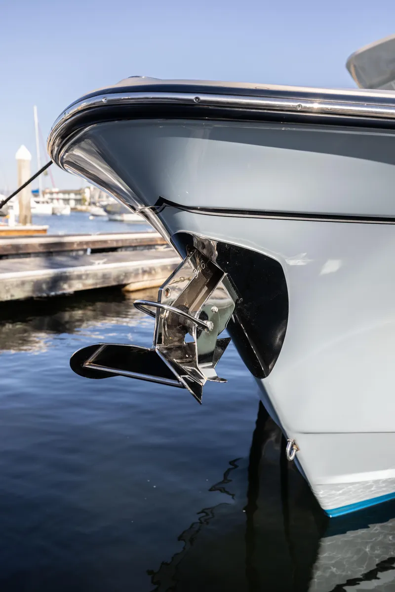 Slide: The Image of 2022 Grady-White 30.6 Canyon boat bow at marina, close-up view. - 24