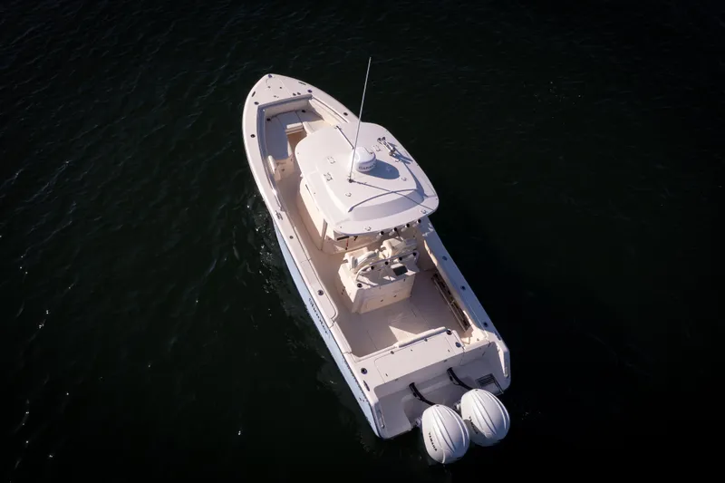 Slide: The Image of 2022 Grady-White 30.6 Canyon boat on water, aerial view. - 28