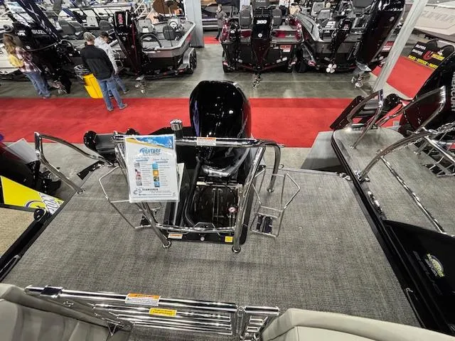 Slide: The Image of 2025 Barletta CORSA 23QC boat interior at a showroom, featuring sleek design and modern amenities. - 11