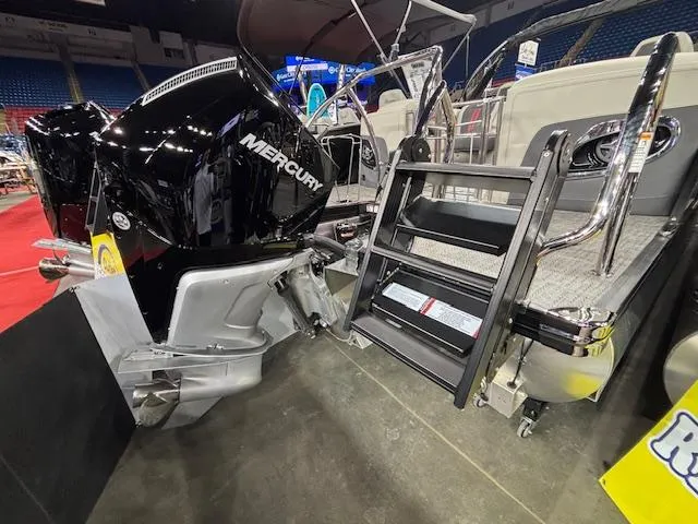 Slide: The Image of 2025 Barletta CORSA 23QC boat with Mercury engine and boarding ladder. - 12