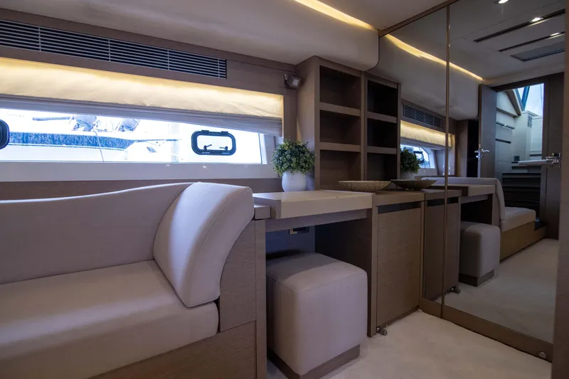 Slide: The Image of Luxurious interior of 2018 Prestige 680 Flybridge yacht with elegant seating and decor. - 24