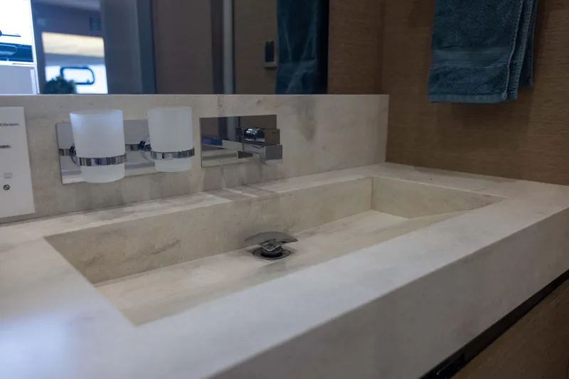 Slide: The Image of Luxurious bathroom sink in 2018 Prestige 680 Flybridge yacht. - 26