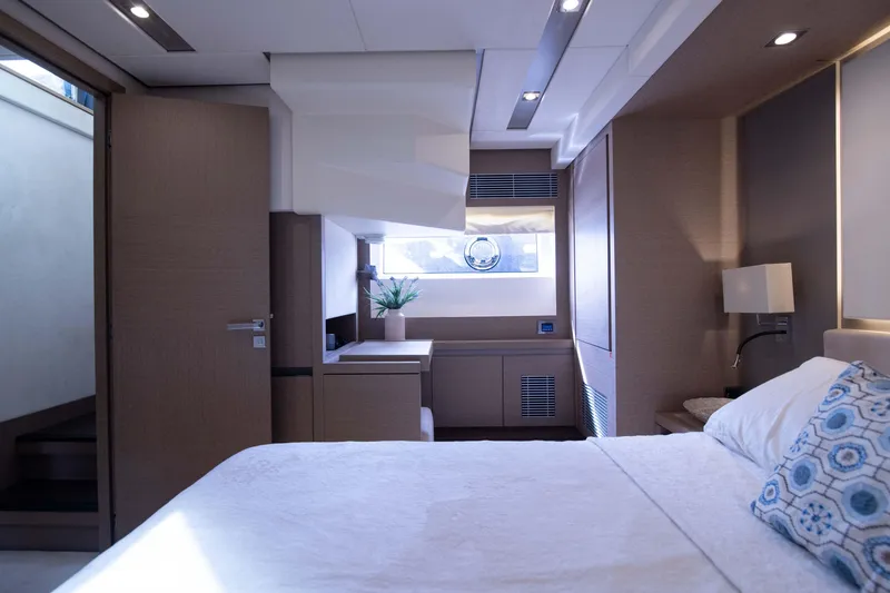 Slide: The Image of Luxurious interior of 2018 Prestige 680 Flybridge yacht bedroom with modern decor. - 34
