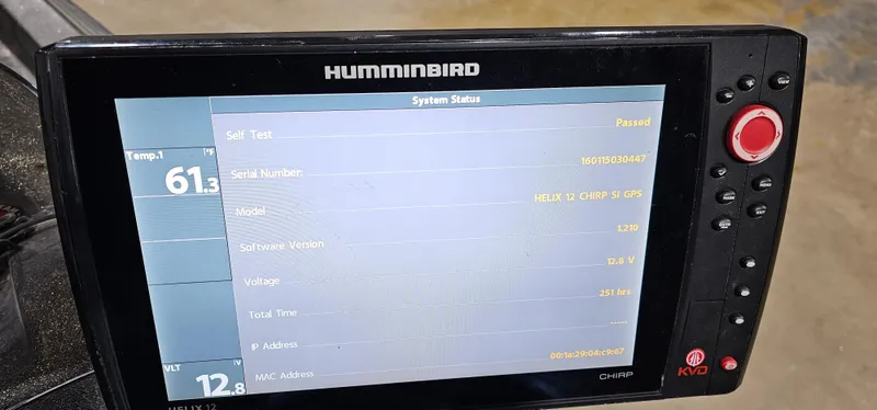 Slide: The Image of Humminbird fish finder display showing system status and temperature readings. Cajun Master 1996. - 26