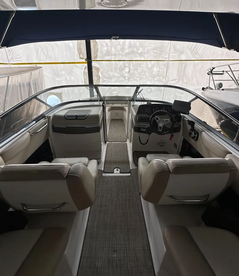 Slide: The Image of 2012 Regal 2700 Bowrider interior, featuring sleek seating and modern dashboard design. - 11