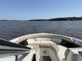 Slide: The Image of 2012 Regal 2700 Bowrider on calm lake with scenic shoreline view. - 17