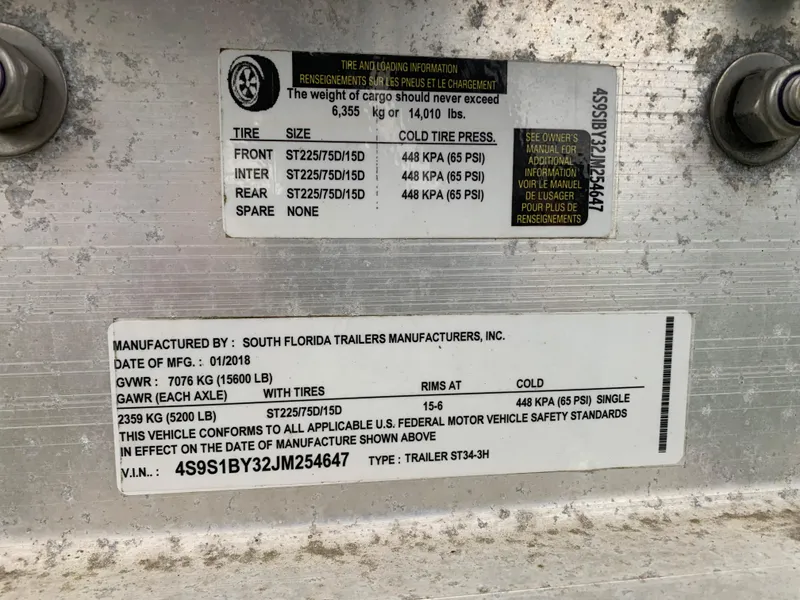 Slide: The Image of Label on a 2007 Pursuit OS 335 trailer detailing tire specifications and manufacturing information. - 3