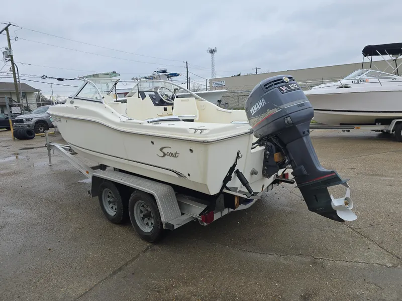 Slide: The Image of 2003 Scout 202 Dorado boat on trailer with Yamaha outboard motor. - 4