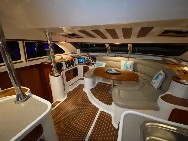 Slide: The Image of Luxurious interior of 2013 Africat Marine AfriCat PowerCat Sportfisher with plush seating and modern amenities. - 17