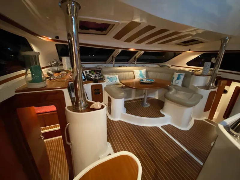 Slide: The Image of Luxurious interior of 2013 Africat Marine AfriCat PowerCat Sportfisher with elegant seating and wooden flooring. - 21