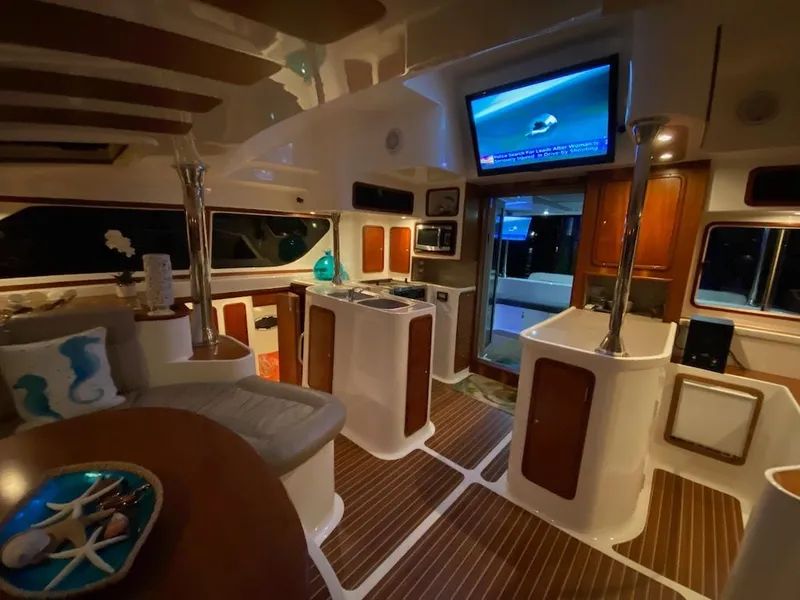 Slide: The Image of Luxurious interior of 2013 Africat PowerCat Sportfisher with modern amenities and elegant design. - 24