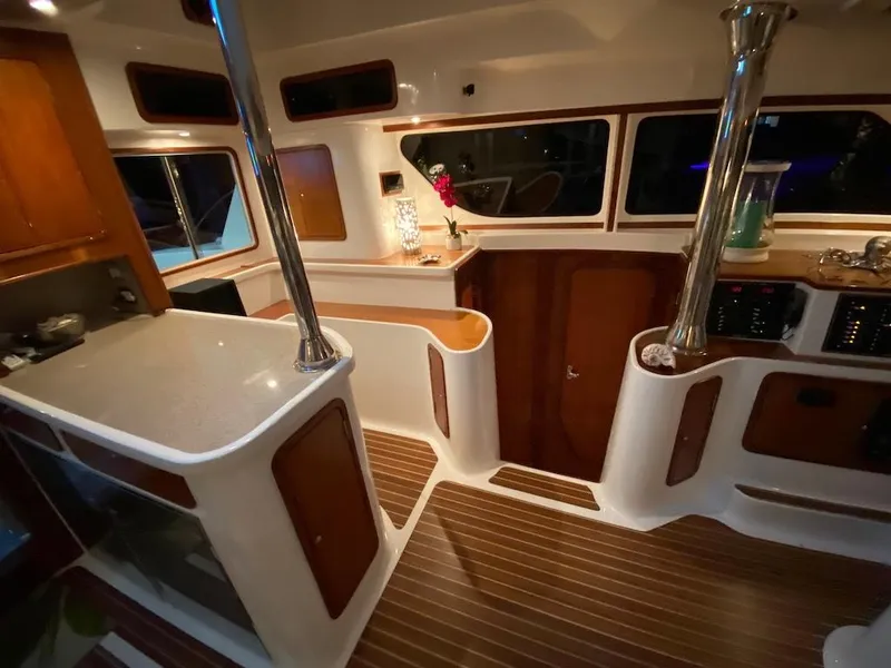 Slide: The Image of 2013 Africat Marine AfriCat PowerCat Sportfisher interior with wood accents and modern design. - 25