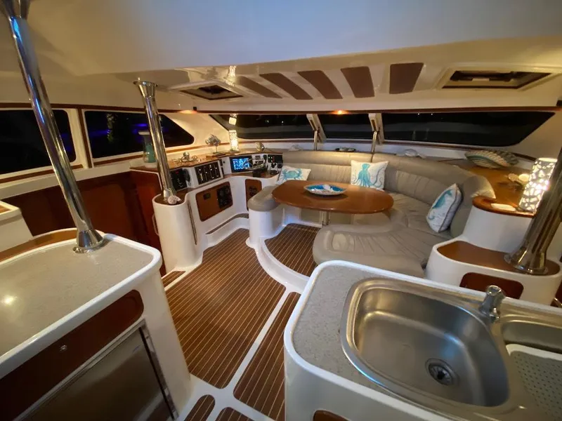Slide: The Image of Luxurious interior of 2013 Africat PowerCat Sportfisher with modern amenities and elegant design. - 26