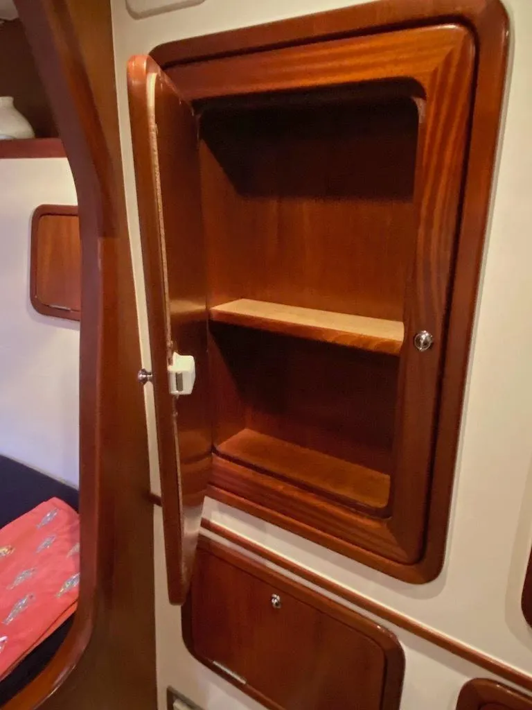 Slide: The Image of Wooden cabinet interior on 2013 Africat Marine AfriCat PowerCat Sportfisher yacht. - 43