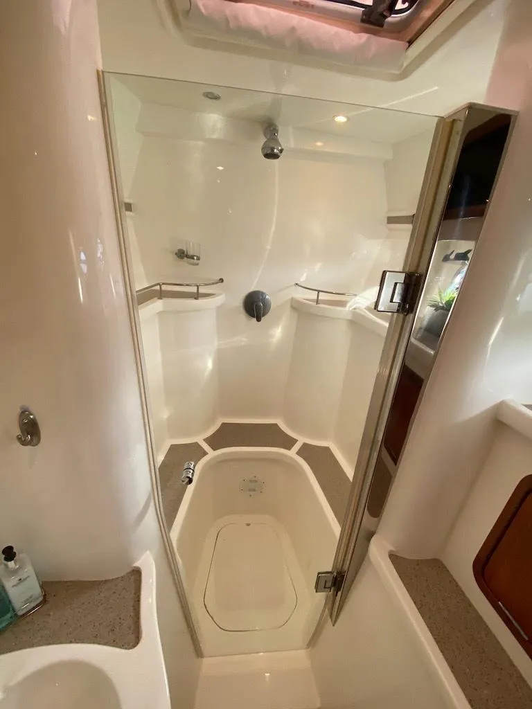 Slide: The Image of 2013 Africat PowerCat Sportfisher bathroom with modern shower and sleek design. - 47