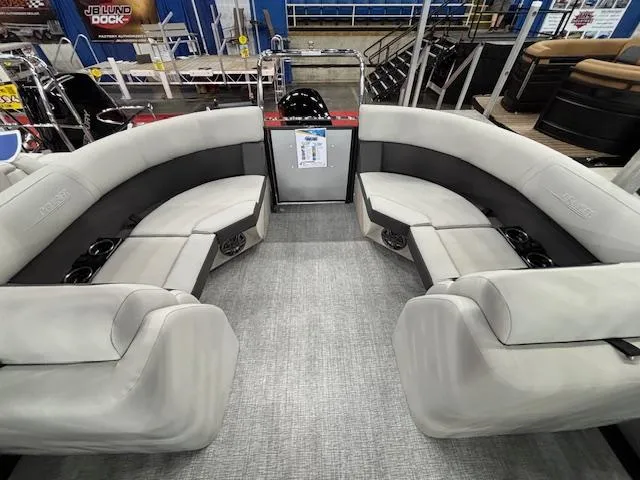 Slide: The Image of 2025 Harris Cruiser 230 interior with spacious seating and modern design. - 10