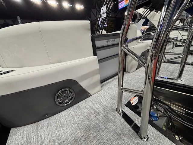 Slide: The Image of 2025 Harris Cruiser 230 interior with sleek seating and modern design elements. - 14