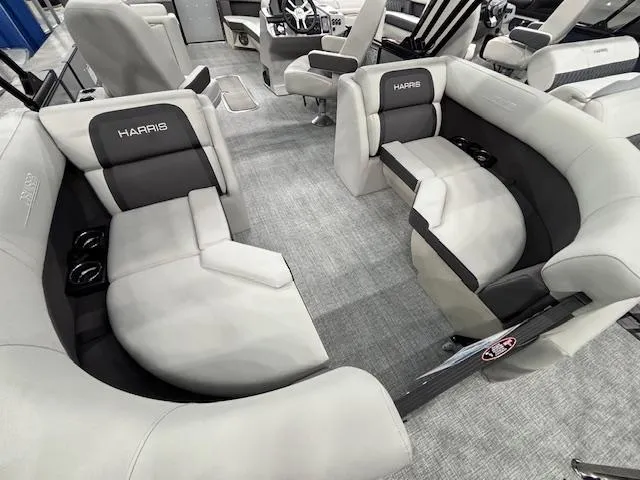 Slide: The Image of Luxurious interior of 2025 Harris Cruiser 230 pontoon boat with plush seating. - 15