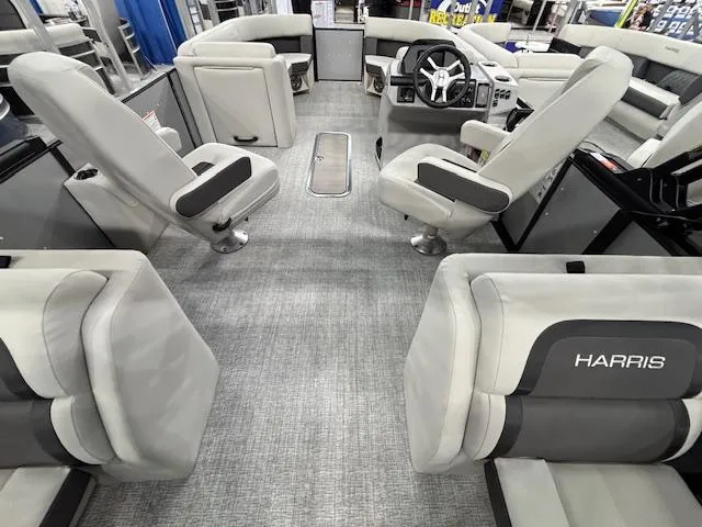 Slide: The Image of Interior of 2025 Harris Cruiser 230 pontoon boat with plush seating and modern design. - 16