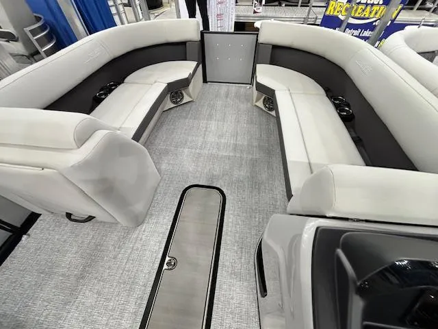 Slide: The Image of 2025 Harris Cruiser 230 interior with spacious seating and modern design. - 23