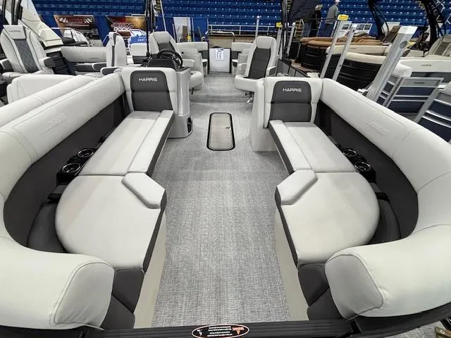 Slide: The Image of 2025 Harris Cruiser 230 pontoon boat interior with spacious seating and modern design. - 3