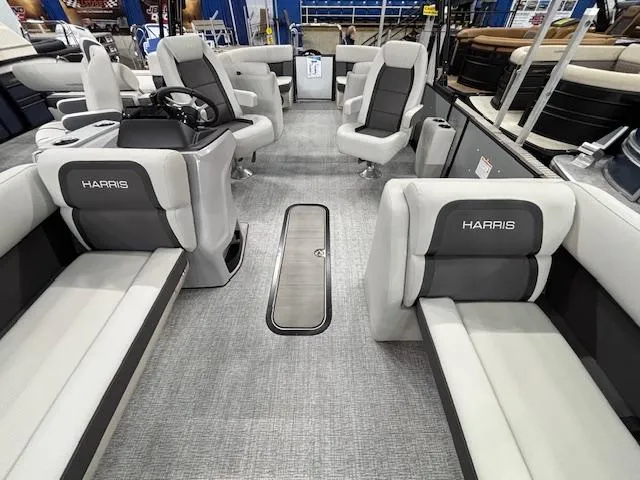 Slide: The Image of 2025 Harris Cruiser 230 pontoon boat interior with luxurious seating and modern design. - 4