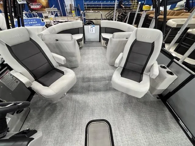 Slide: The Image of 2025 Harris Cruiser 230 interior with plush seating and modern design. - 8