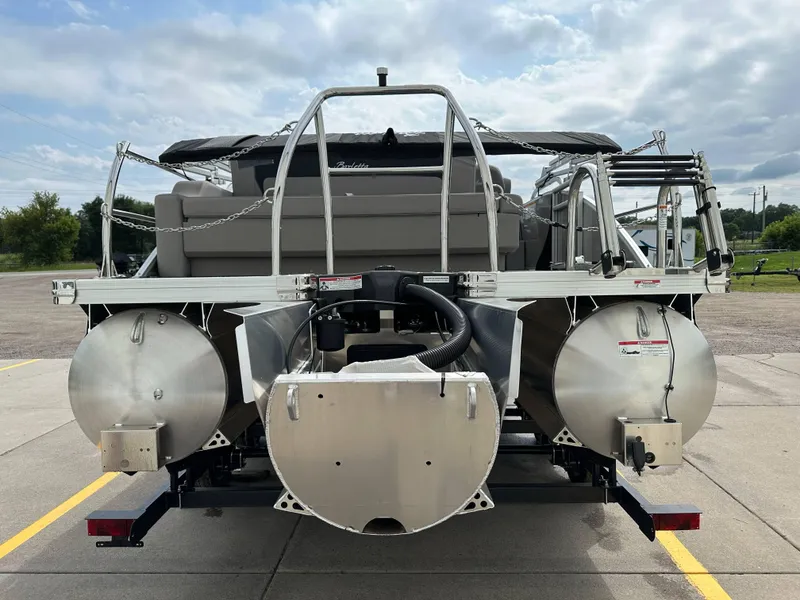 Slide: The Image of 2025 Barletta Aria 24UC pontoon boat rear view, showcasing dual pontoons and seating. - 30