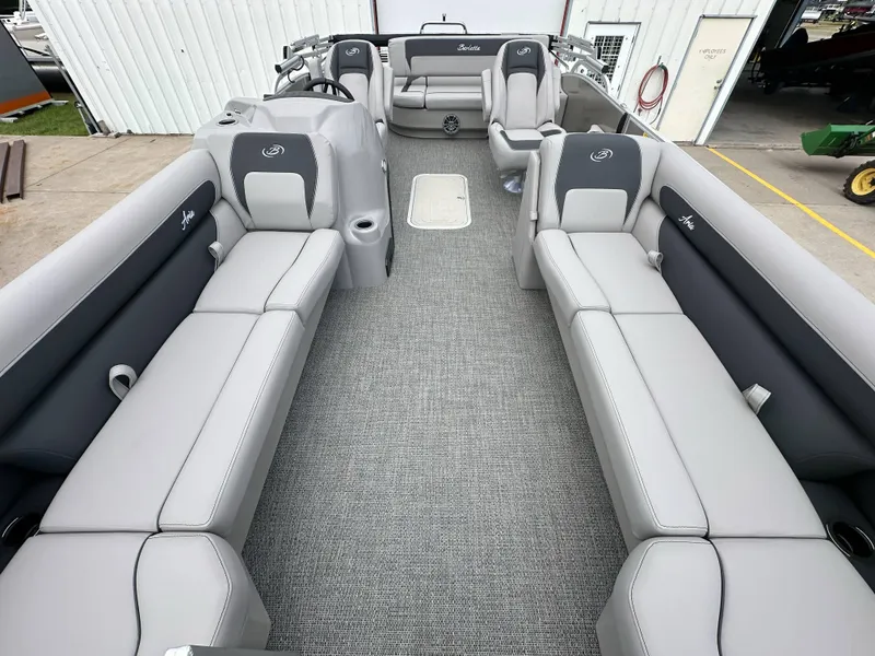 Slide: The Image of 2025 Barletta Aria 24UC pontoon boat interior with spacious seating and modern design. - 9