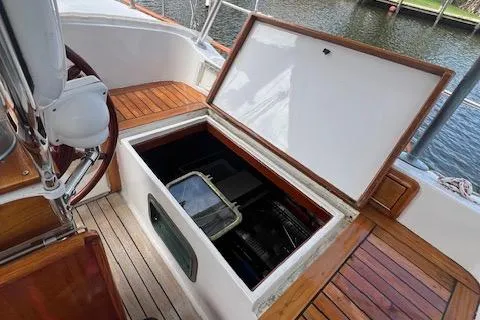 Slide: The Image of Open storage compartment on 1981 Hardin Voyager 45 Ketch sailboat deck. - 29