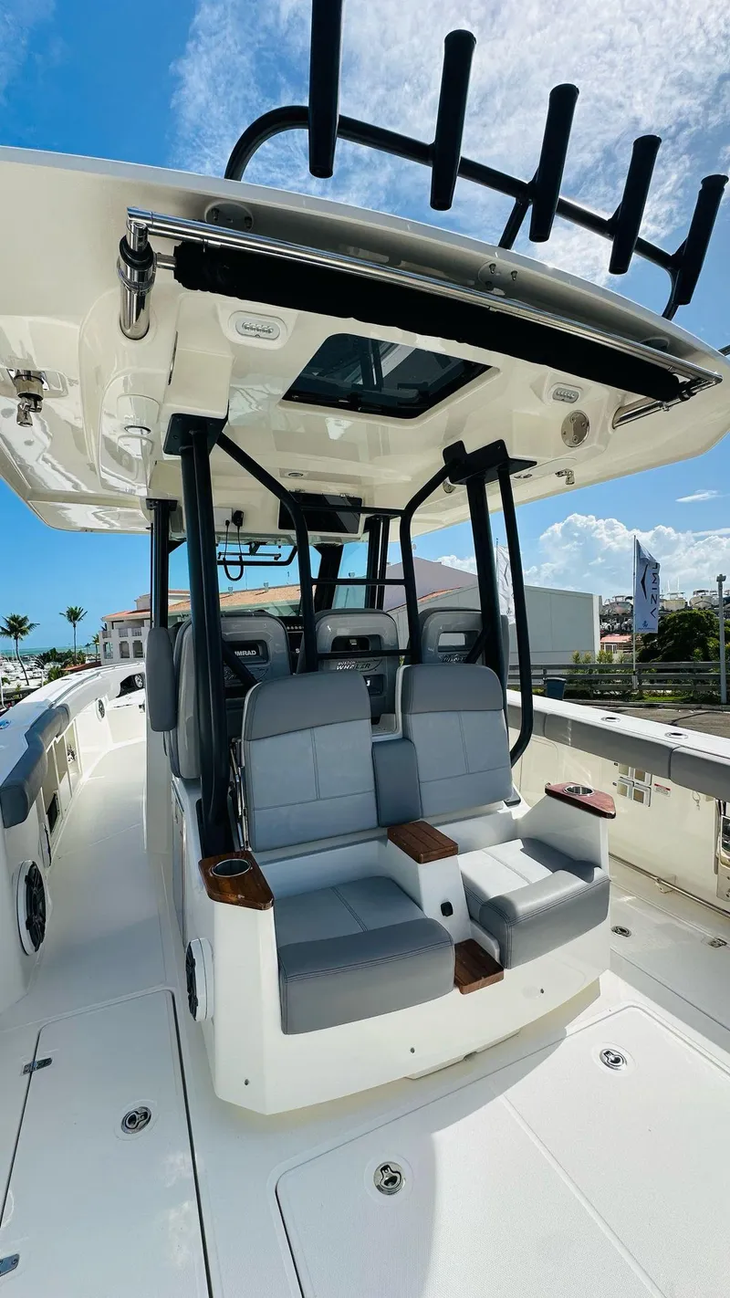 Slide: The Image of 2023 Boston Whaler 360 Outrage boat with sleek seating and modern design. - 5