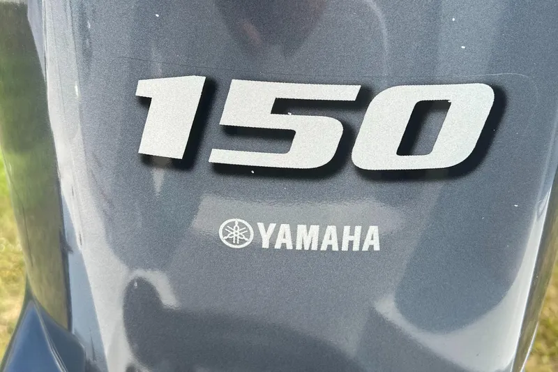 Slide: The Image of Yamaha 150 outboard motor on 2023 Edgewater 208CC boat. - 29