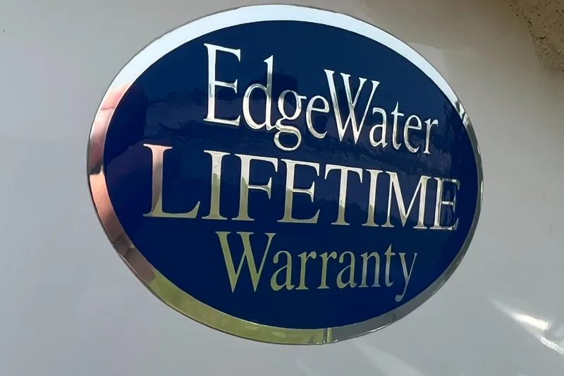 Slide: The Image of EdgeWater 208CC 2023 model with lifetime warranty badge. - 30