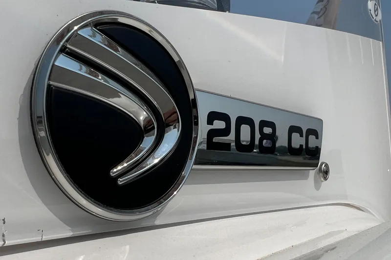 Slide: The Image of Edgewater 208CC 2023 model emblem on a sleek white surface. - 31