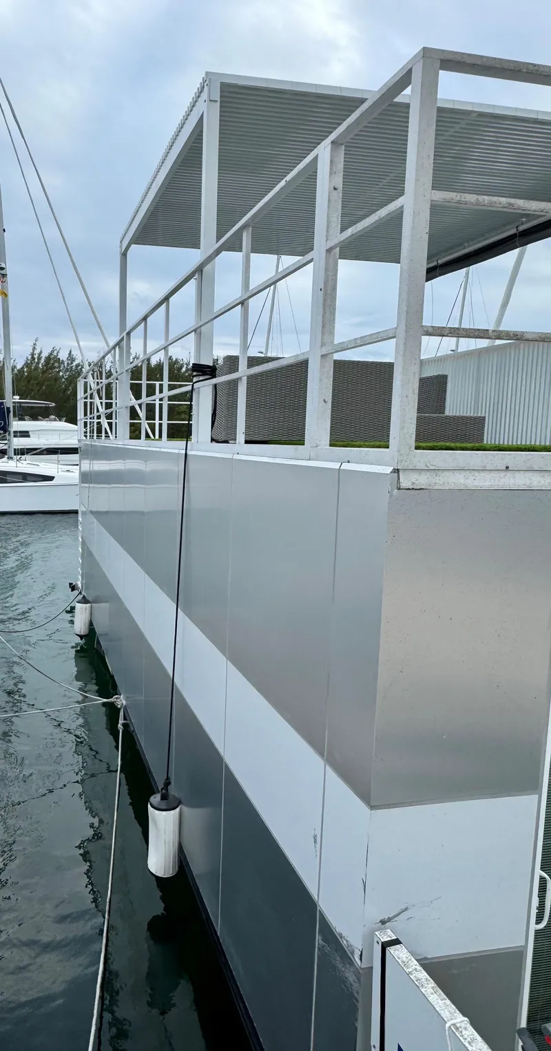 Slide: The Image of Modern Struktures MS 400 floating structure, 2023 model, docked on water. - 25
