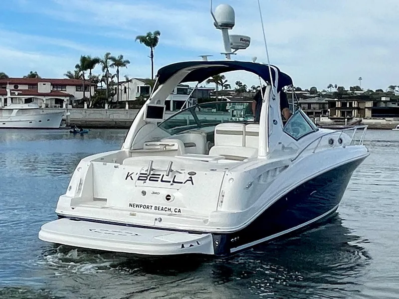 Slide: The Image of 2006 Sea Ray 320 Sundancer boat cruising in Newport Beach marina. - 6
