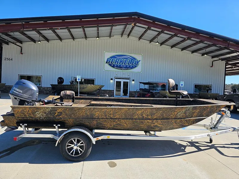 The Image of 2025 G3 Gator Tough 18 DK boat on trailer outside Berkeley building. - 0