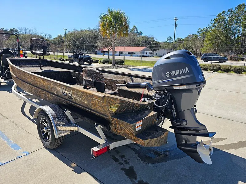 Slide: The Image of 2025 G3 Gator Tough 18 DK boat with Yamaha motor on trailer. - 13