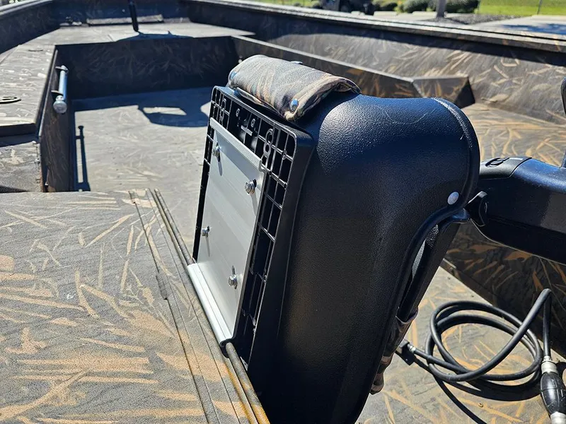 Slide: The Image of 2025 G3 Gator Tough 18 DK boat interior with camo seating and durable design. - 17