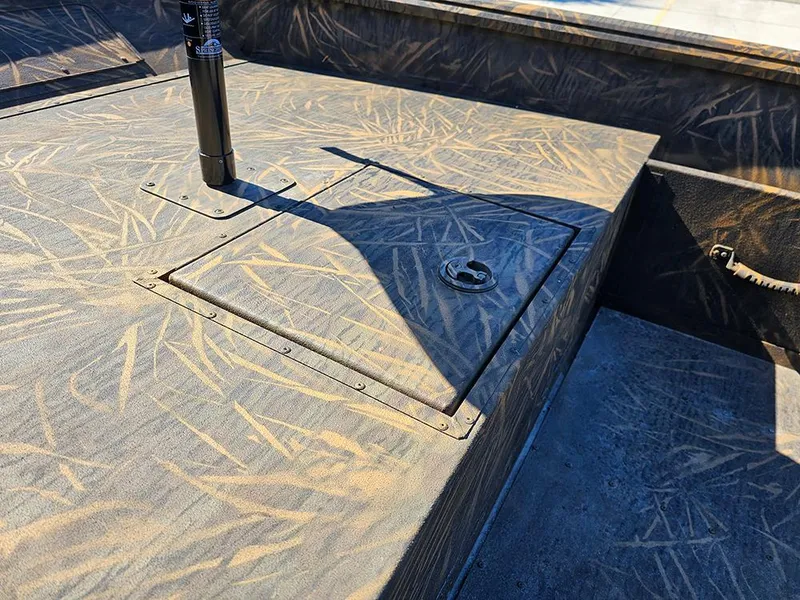 Slide: The Image of 2025 G3 Gator Tough 18 DK boat deck with camouflage pattern and hatch. - 20