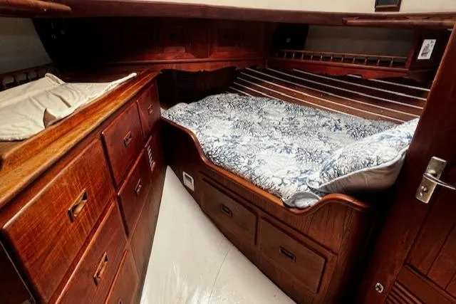 Slide: The Image of Cozy cabin interior of 1978 Custom Fantasia C/C Double Ended Cutter with wooden furnishings. - 12