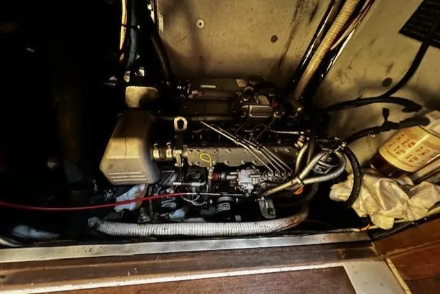 Slide: The Image of Engine compartment of a 1978 Custom Fantasia C/C Double Ended Cutter, showing detailed mechanical components. - 29