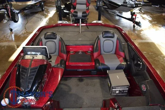 Slide: The Image of 2017 Ranger Z521C boat interior with dual seats and storage compartments. - 15