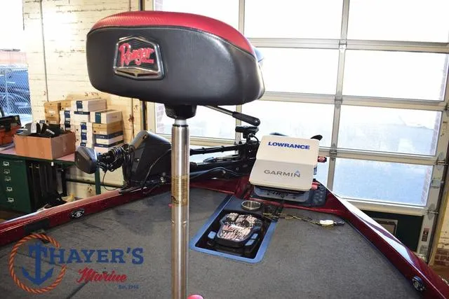 Slide: The Image of 2017 Ranger Z521C boat interior with Lowrance and Garmin equipment, Thayer's Marine logo visible. - 18